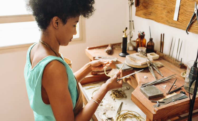 Person making jewelry